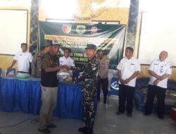 TMMD 116 Kodim 0822 Bondowoso Serahkan Seragam Linmas