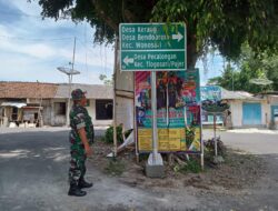 Satgas TMMD Reg 116 Bondowoso Pasang Rambu Jalan