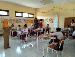 Sinergi Babinsa dan SPPG Al Amin Dampingi Program Makan Bergizi Gratis di SDN 1 Kerang, Bondowoso